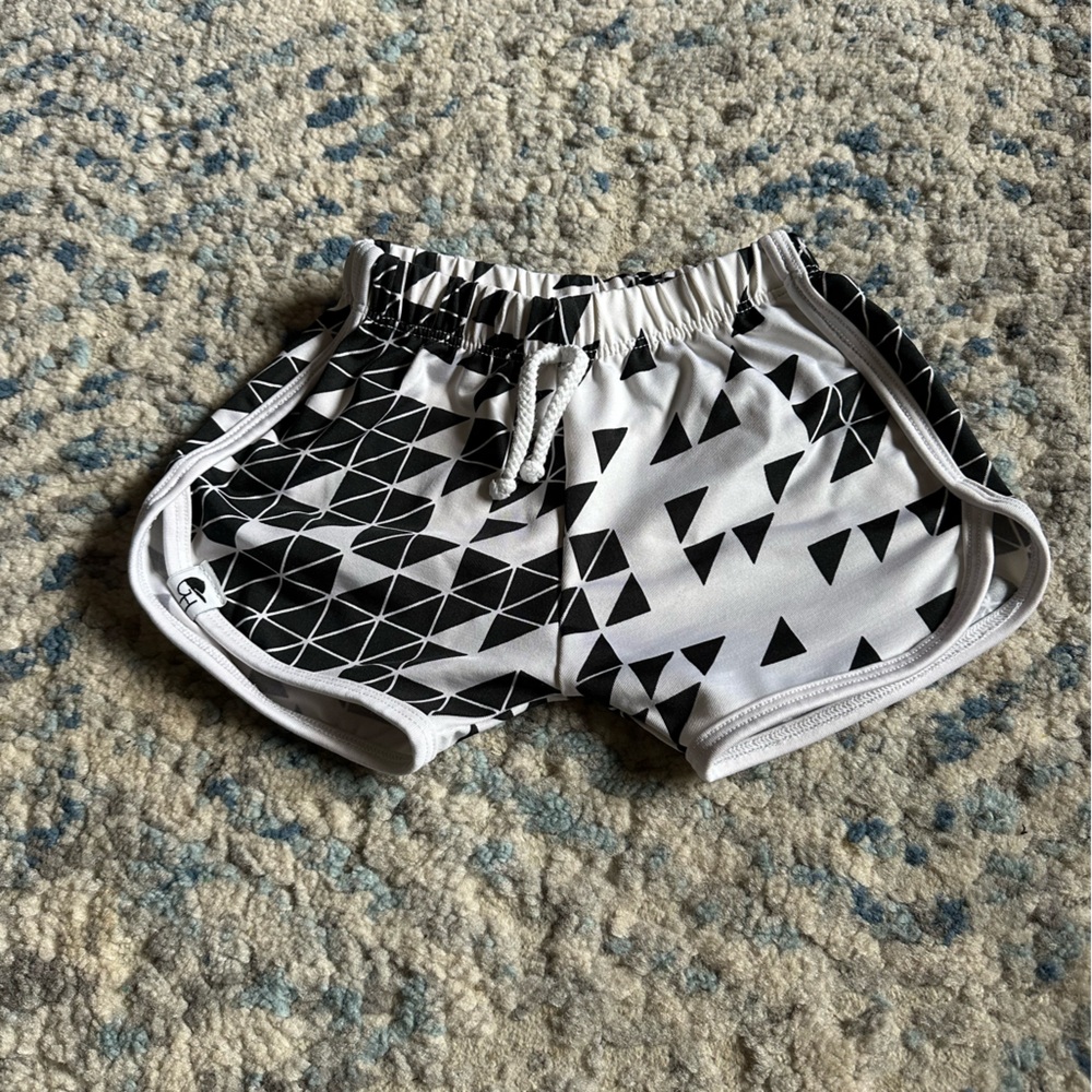 George Hats stretch swim bottoms size 18-24m.